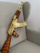 Who owned a gold ak-47?