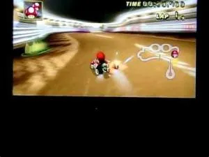 How to do the trick on mario kart wii with controller?