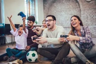 What why does playing games make someone feel happy?