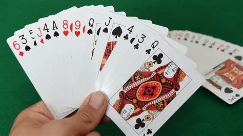 How do you play 5000 rummy card game?